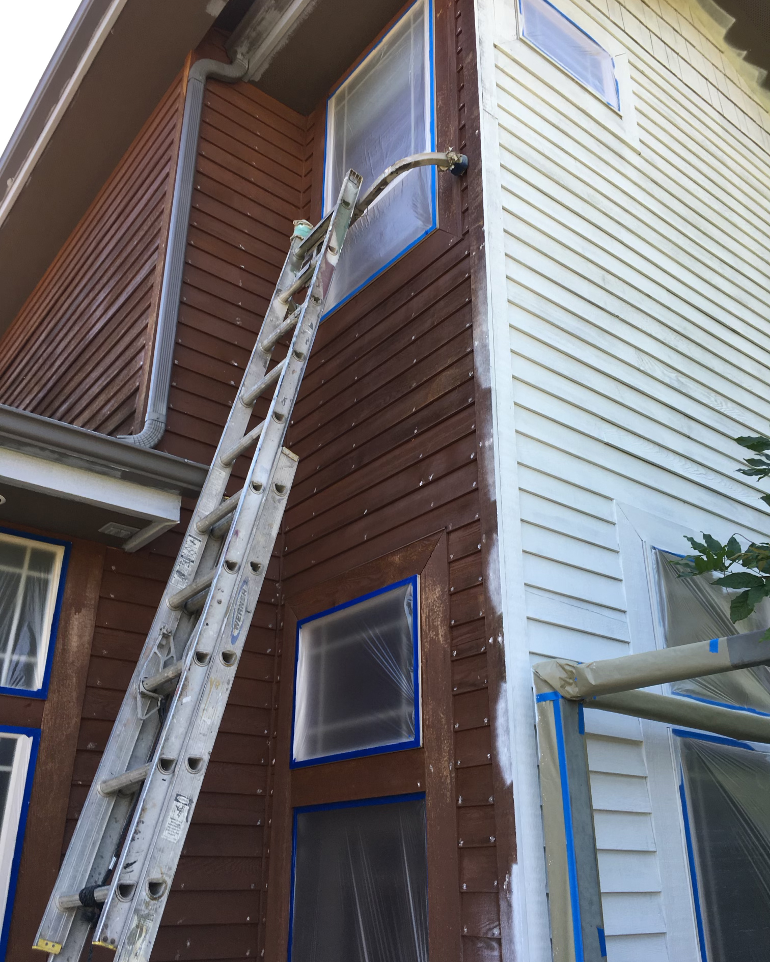 Exterior or residential home showing painting work by RP Painting in progress